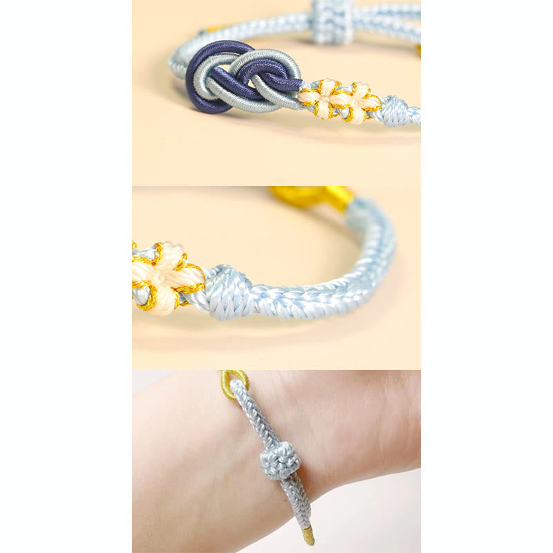 Bracelet artisanal à huit fils rouges avec nœud de paix