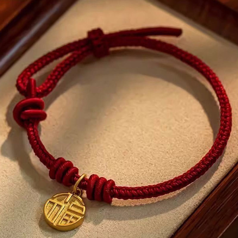 Bracelet fait main à huit fils rouges pour la chance et la protection
