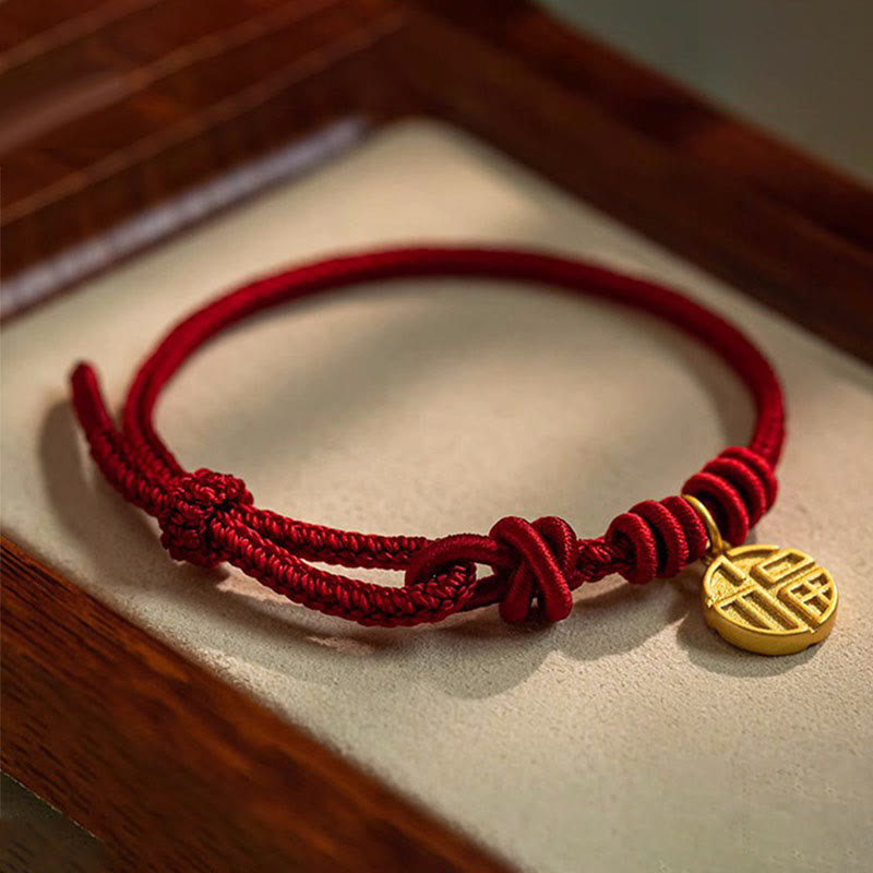 Bracelet fait main à huit fils rouges pour la chance et la protection