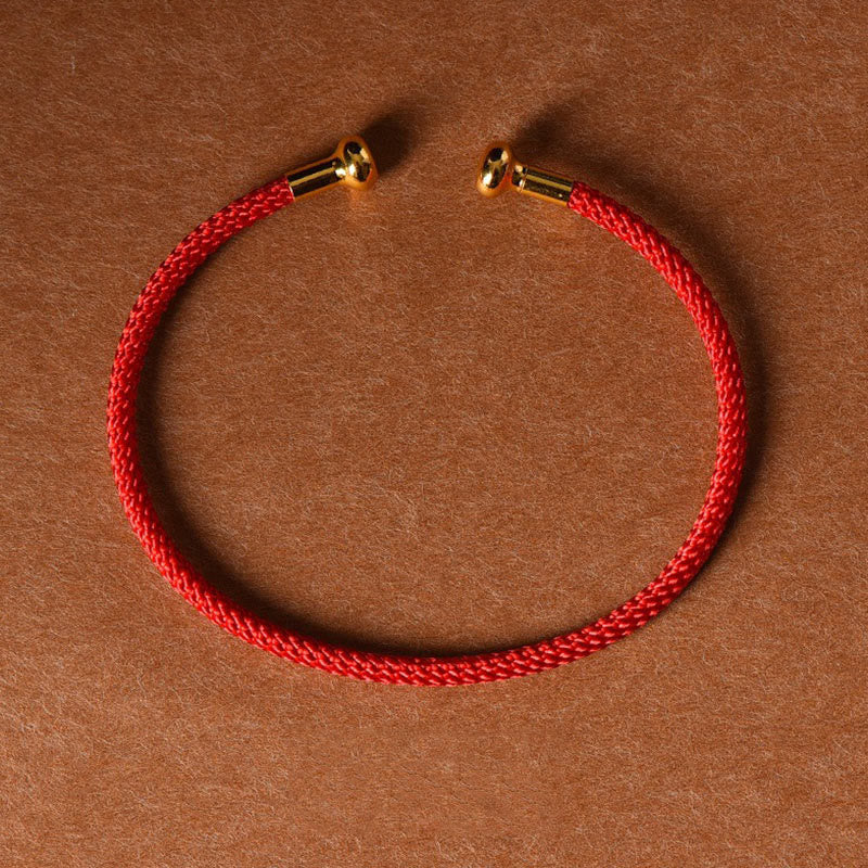 Bracelets porte-bonheur faits à la main en fil rouge pour la protection spirituelle