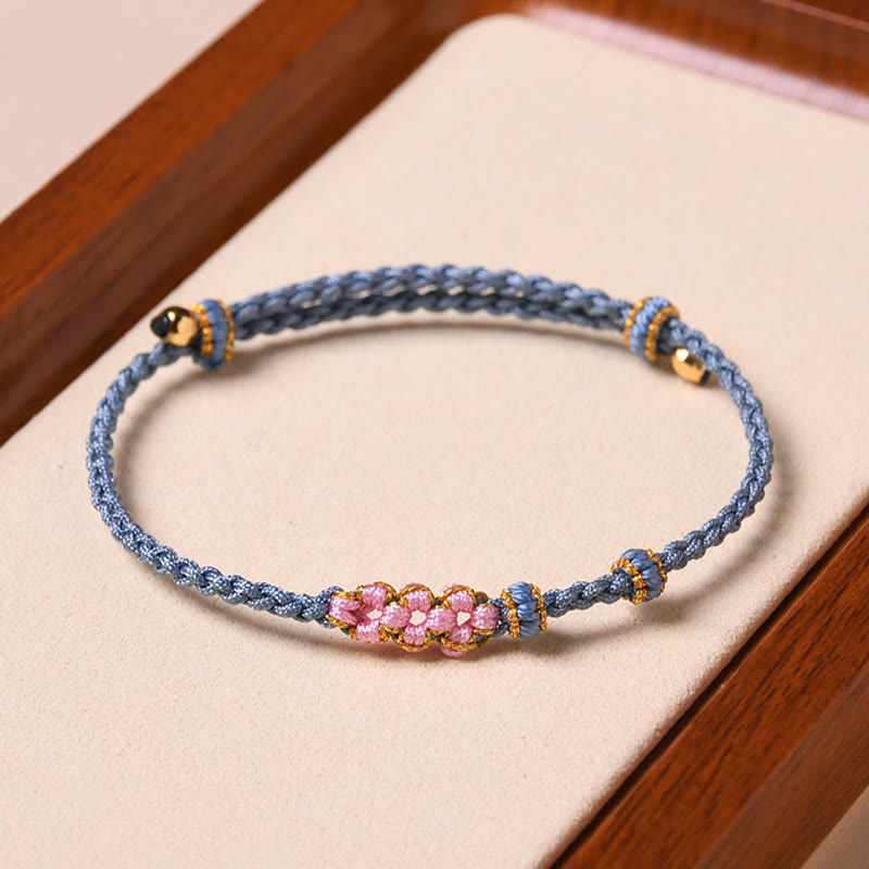 Bracelet de protection en fil rouge fait main pour le renouveau et la chance