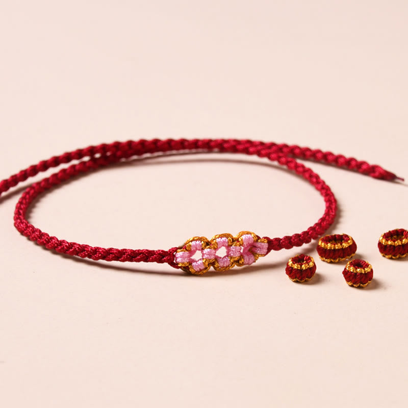 Bracelet de protection en fil rouge fait main pour le renouveau et la chance