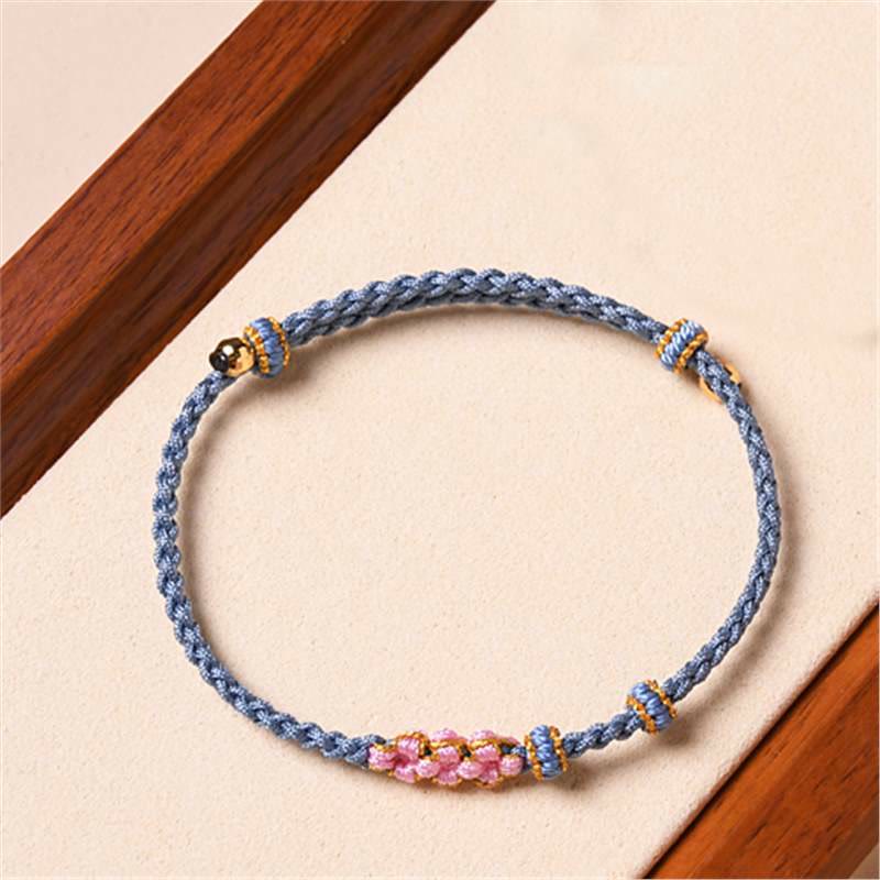 Bracelet de protection en fil rouge fait main pour le renouveau et la chance