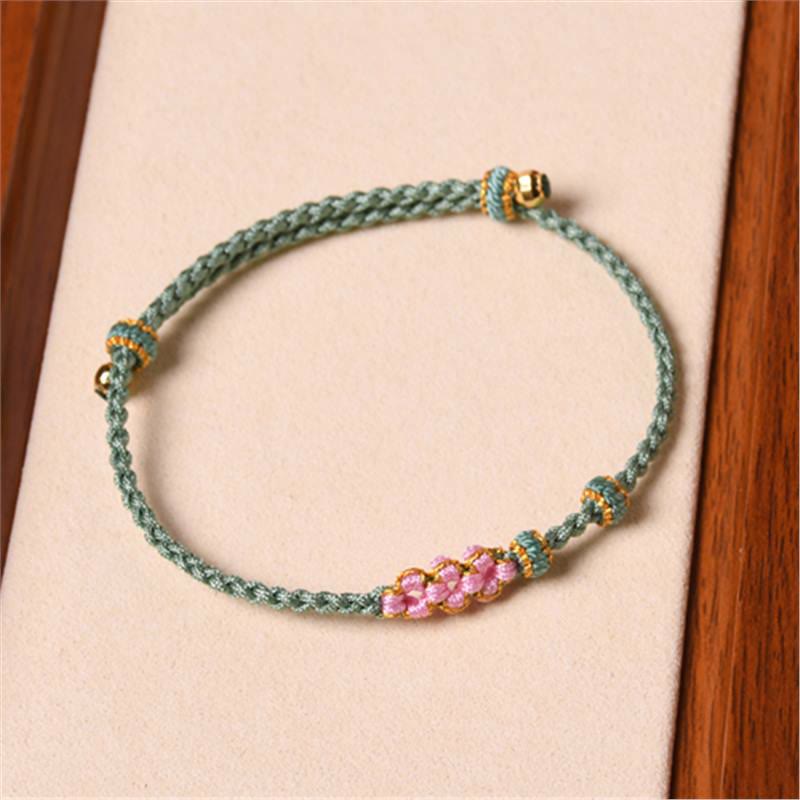 Bracelet de protection en fil rouge fait main pour le renouveau et la chance