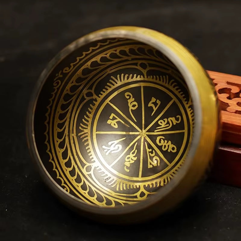 Handmade Tibetan Singing Bowl with black and gold mandala design for healing