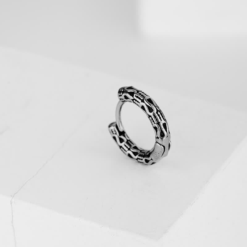 Boucles d'oreilles en acier titane faites à la main pour l'harmonie intérieure