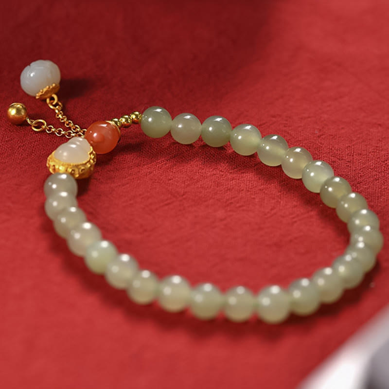 Bracelet porte-bonheur en jade Hetian et lotus en argent 925