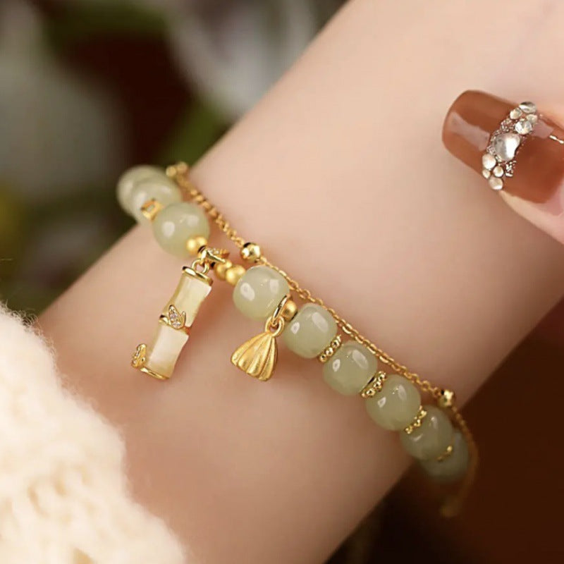 Bracelet à breloques en jade Hetian Lotus pour la prospérité et la croissance