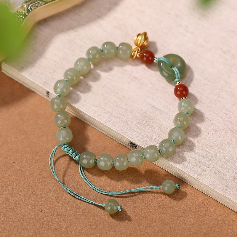 Bracelet porte-bonheur en jade Hetian 6 x 7 mm | Sons de guérison