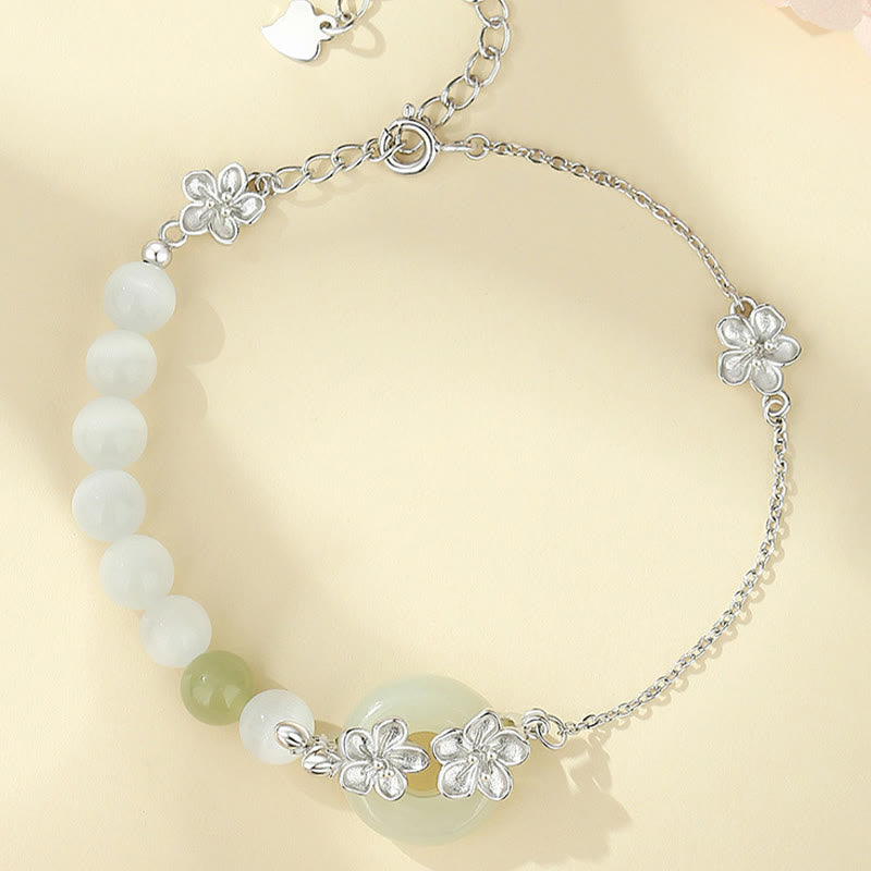 Bracelet porte-bonheur en jade Hetian et fleur de pêcher