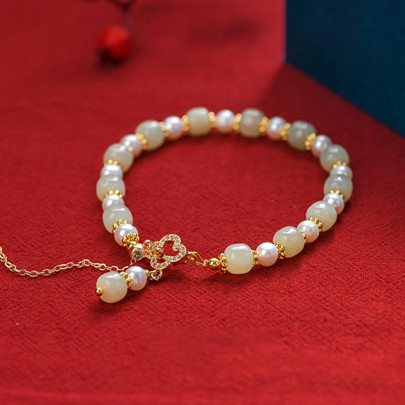 Bracelet d'abondance en perles de jade Hetian pour la prospérité et l'équilibre