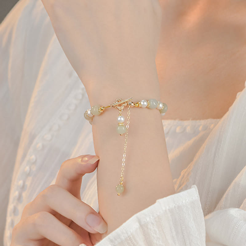 Bracelet d'abondance en perles de jade Hetian pour la prospérité et l'équilibre