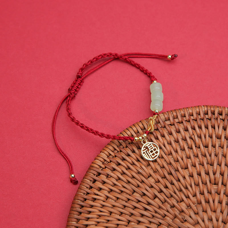 Bracelet en perles de jade avec breloque Fu sur corde rouge pour la chance et la prospérité