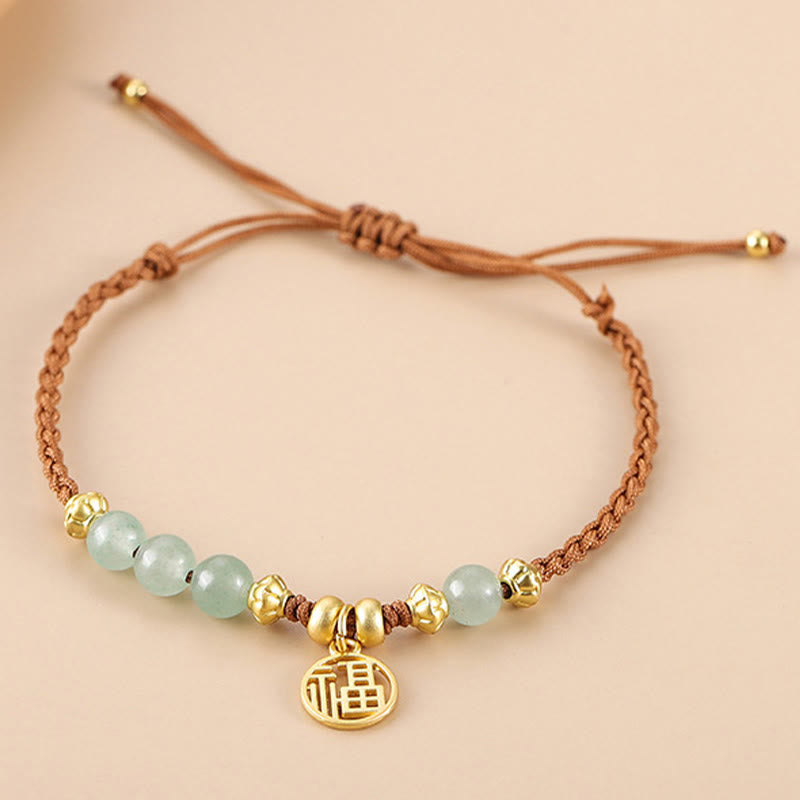Bracelet en perles de jade avec le personnage Fu pour la prospérité et la chance