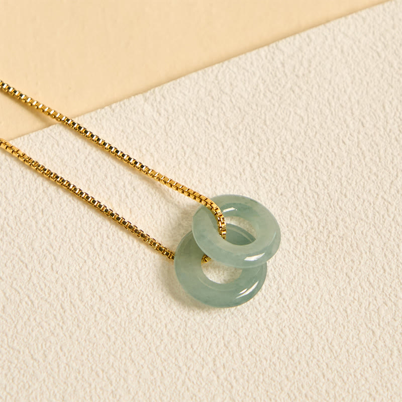 Collier pendentif en jade avec double boucle de paix pour la prospérité