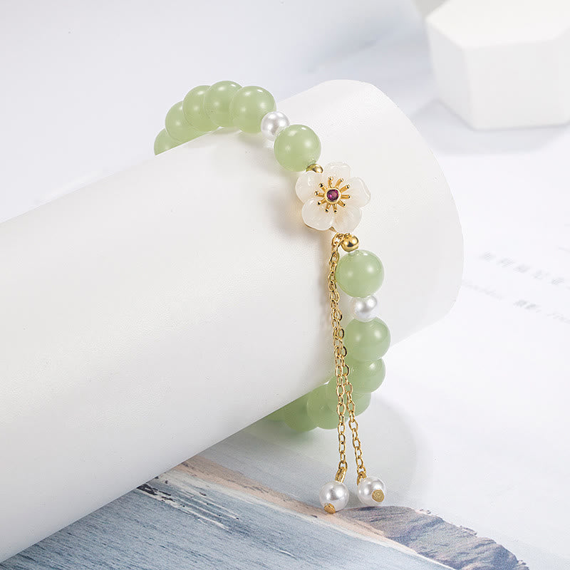 Bracelet porte-bonheur et bénédiction en perles de jade avec fleur de pêcher