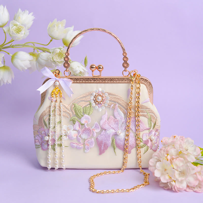 Sac à pompons brodé de fleurs violet clair pour l'énergie spirituelle