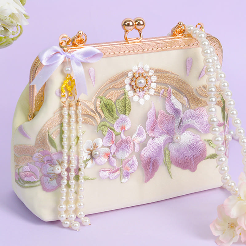Sac à pompons brodé de fleurs violet clair pour l'énergie spirituelle