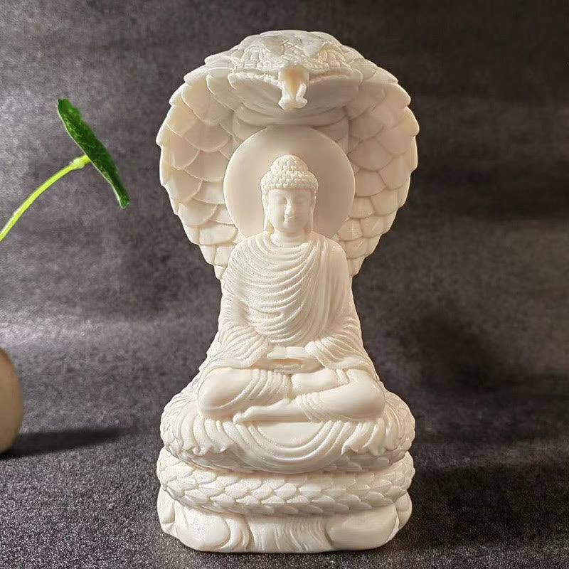 Statue de Bouddha en ivoire de taille moyenne avec symbole de sérénité du lotus serpent