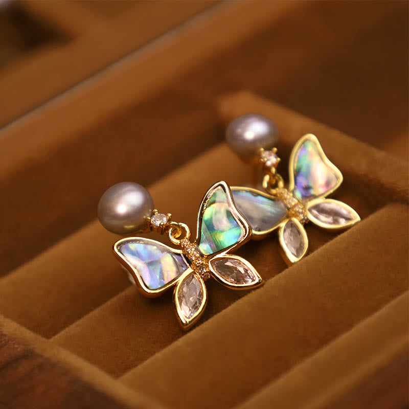 Boucles d'oreilles à tige en nacre d'ormeau naturelle avec motif papillon