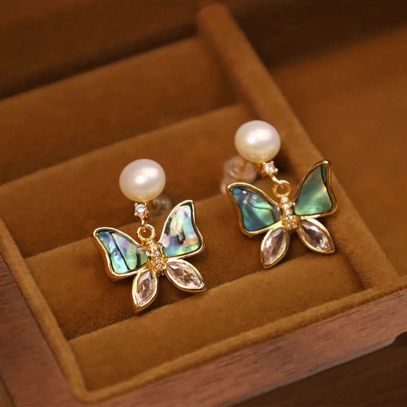 Boucles d'oreilles à tige en nacre d'ormeau naturelle avec motif papillon