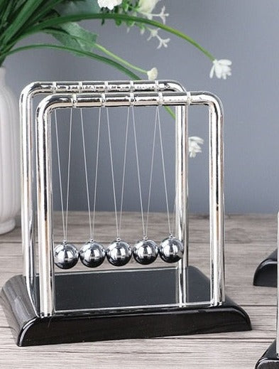 Pendule métallique de Newton