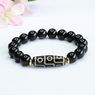 Bracelet de protection en obsidienne et onyx noir à neuf yeux