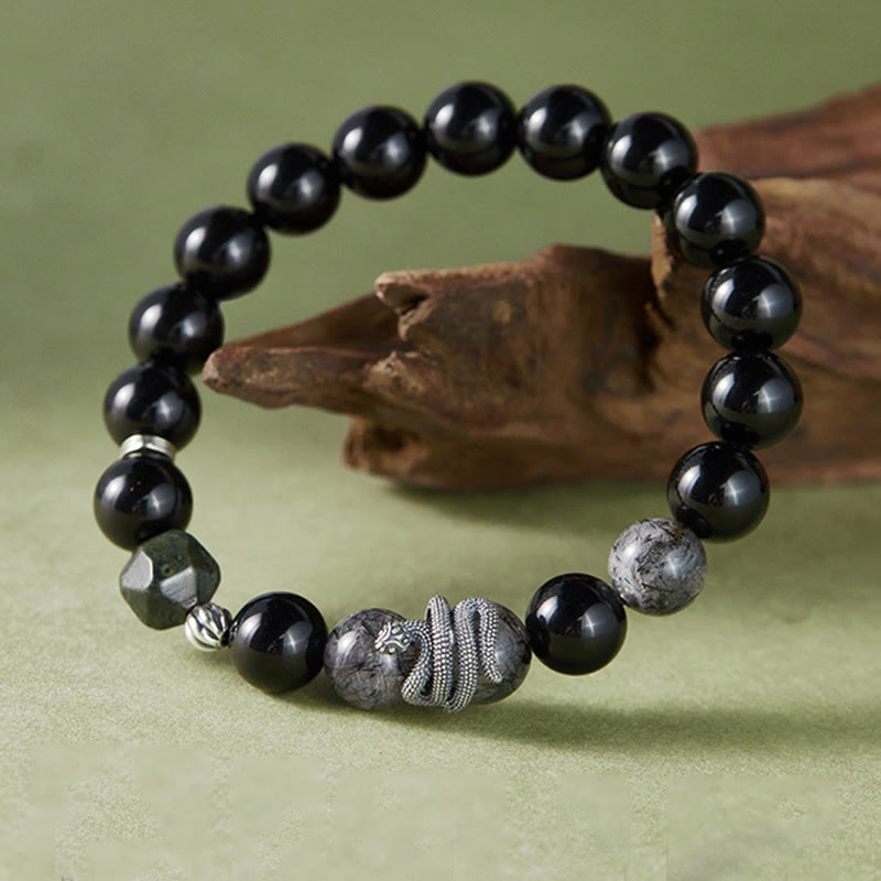 Bracelet serpent en obsidienne et quartz rutile