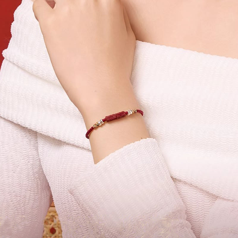 Bracelet à cordes rouge cinabre Om Mani Padme Hum