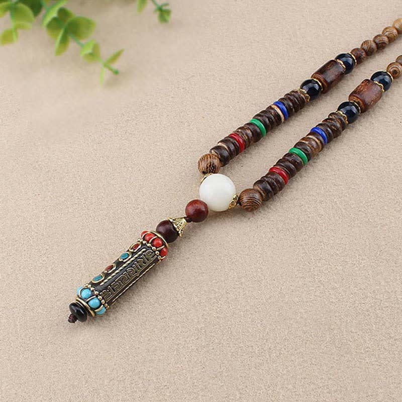 Collier Om Mani Padme Hum | Pendentif dzi en bois de wengé
