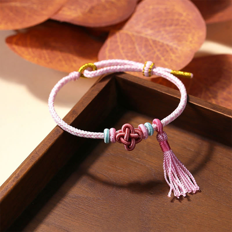 Bracelet de protection coloré en fil de fleur de pêcher pour l'harmonie
