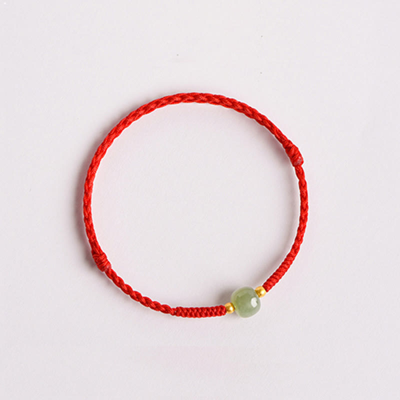Bracelet de perles de jade de prospérité avec cordon rouge tressé