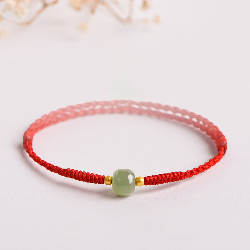 Bracelet de perles de jade de prospérité avec cordon rouge tressé