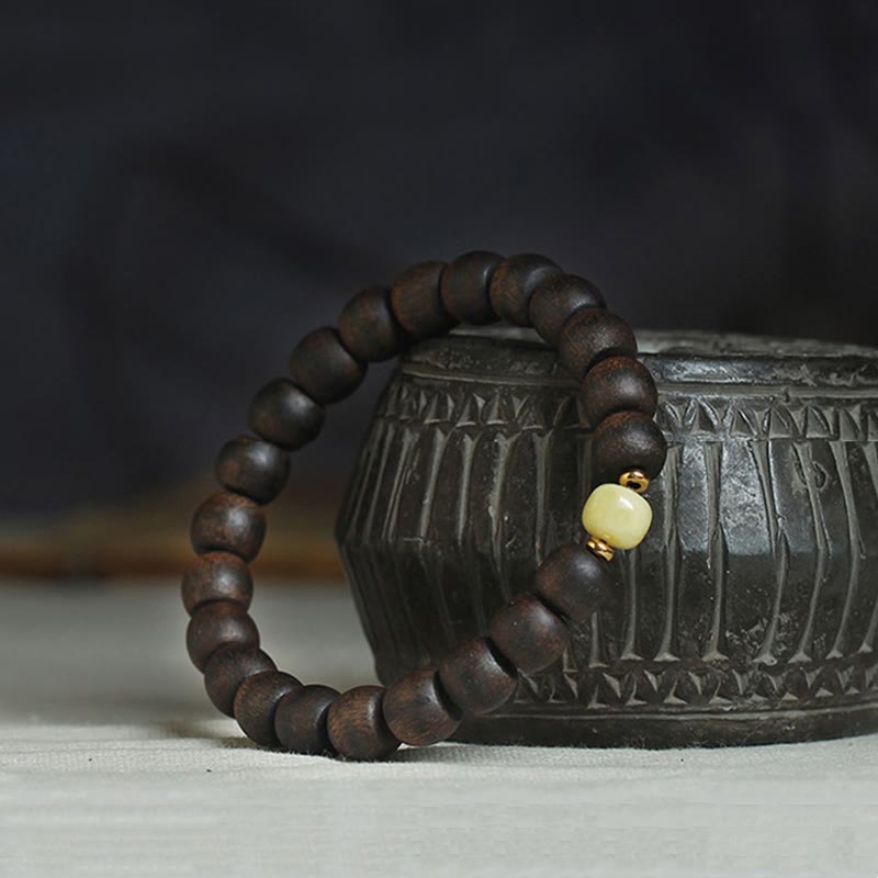 Bracelet en ambre et bois d'agar de Brunei rare pour l'équilibre et le calme