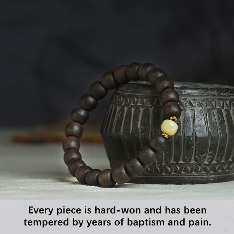 Bracelet en ambre et bois d'agar de Brunei rare pour l'équilibre et le calme