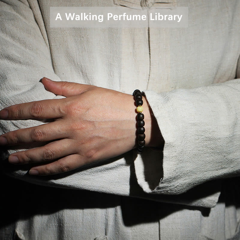 Bracelet en ambre et bois d'agar de Brunei rare pour l'équilibre et le calme