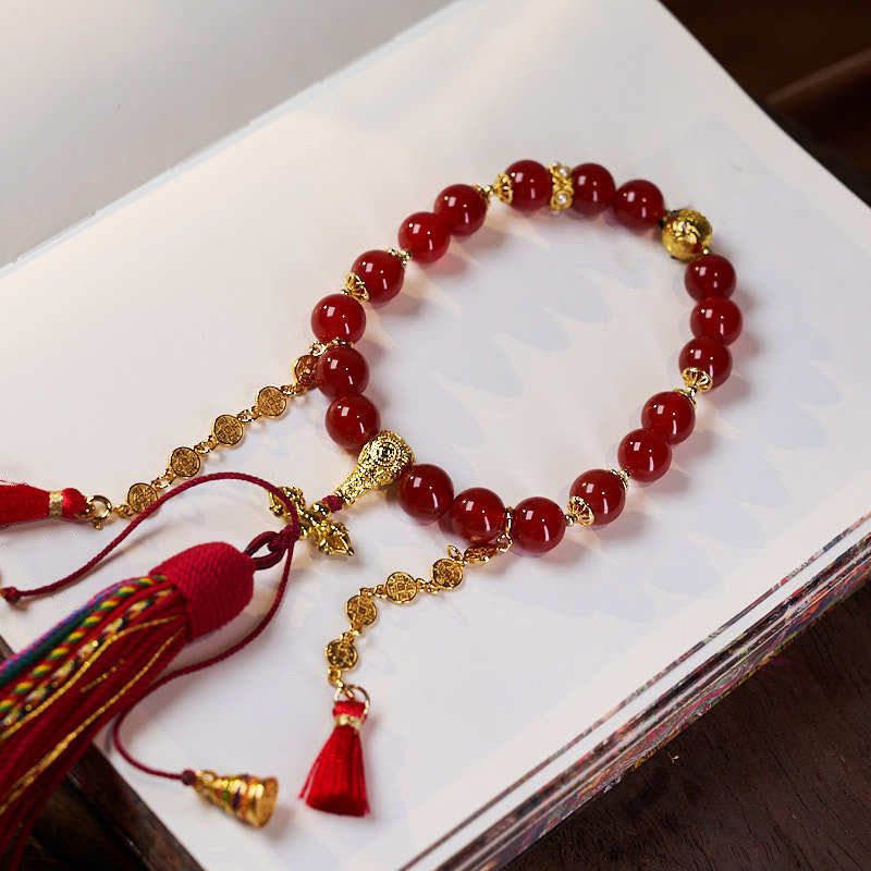 Mala de poignet en agate rouge, 18 perles et pièces de cuivre pour le calme et la confiance