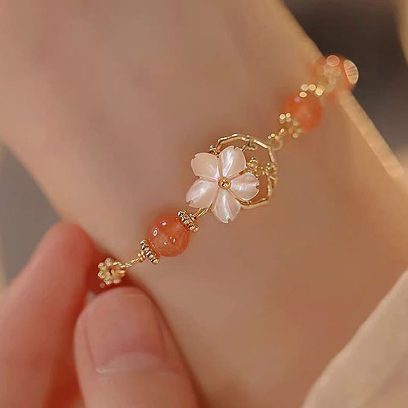 Bracelet de confiance en agate rouge Tridacna pour une force calme