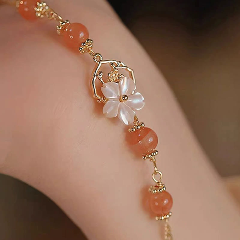 Bracelet de confiance en agate rouge Tridacna pour une force calme