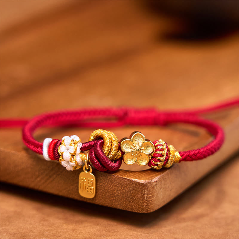 Bracelet en fil rouge avec breloque en fleur de pêcher pour la chance et la protection