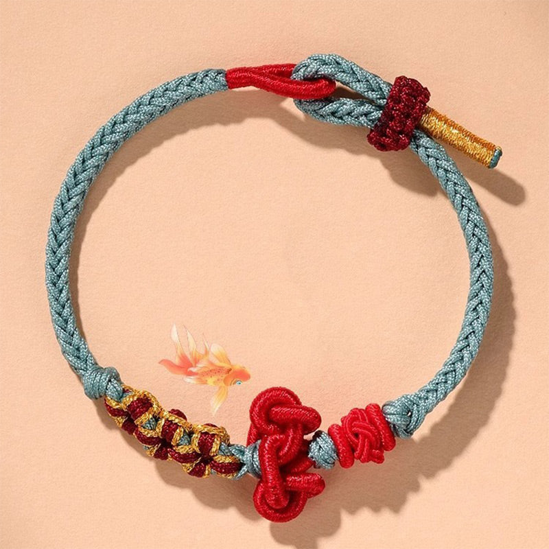 Bracelet fil rouge avec nœud Wenchang | Chance et force
