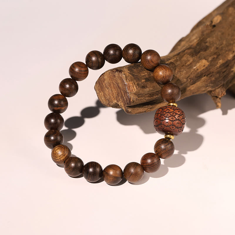 Bracelet spirituel en bois de rose avec le symbole Fu | Chaleur et chance