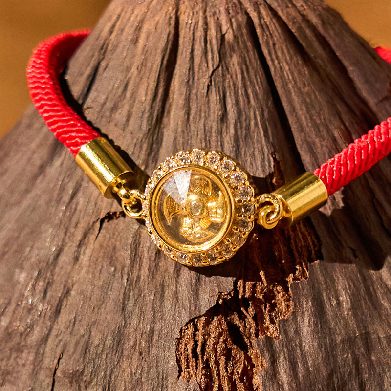 Bracelet Feng Shui en cuivre avec moulin à vent rotatif et fil rouge pour la protection