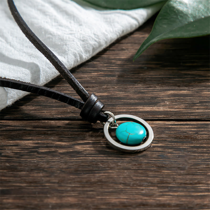 Collier pendentif rond turquoise avec symbole de force de protection