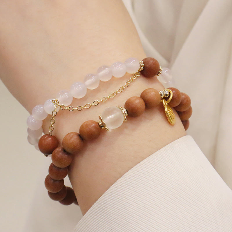 Bracelet de protection à breloques Fu œil de chat en bois de santal