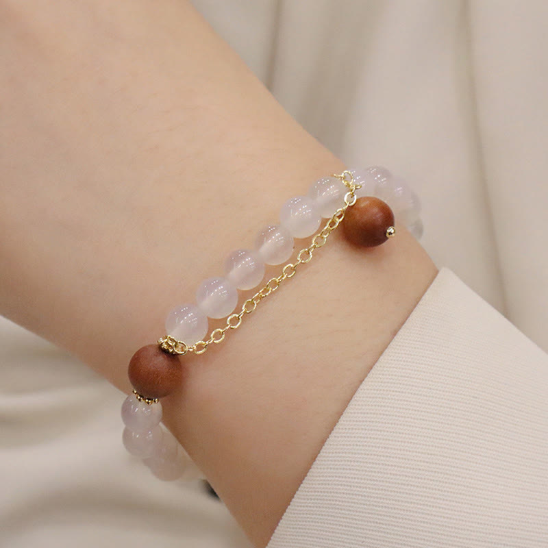 Bracelet de protection à breloques Fu œil de chat en bois de santal