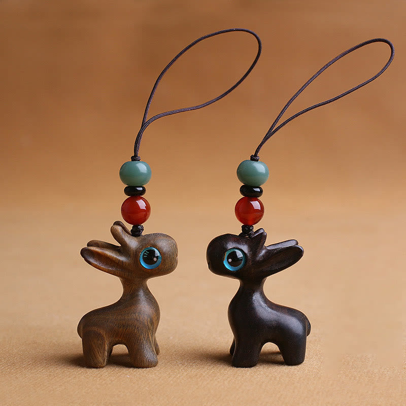 Porte-clés mini-protection contre les cerfs en bois de santal 35 mm