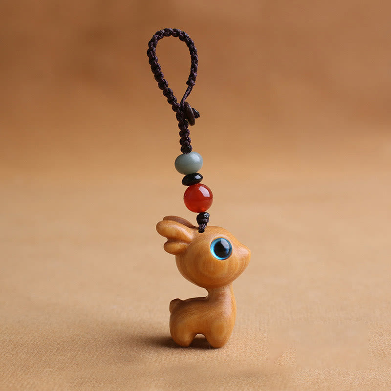 Porte-clés mini-protection contre les cerfs en bois de santal 35 mm