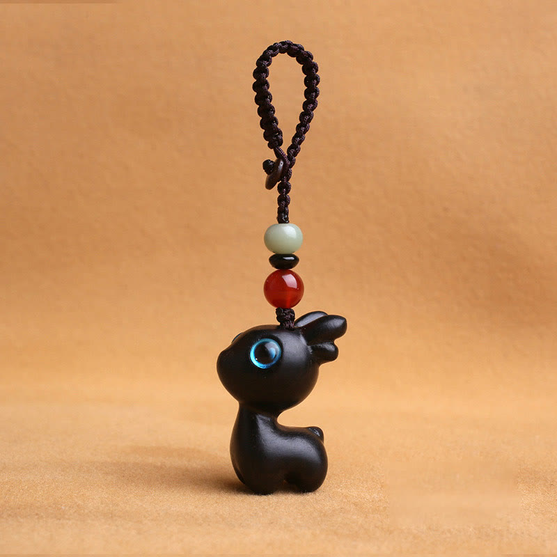 Porte-clés mini-protection contre les cerfs en bois de santal 35 mm