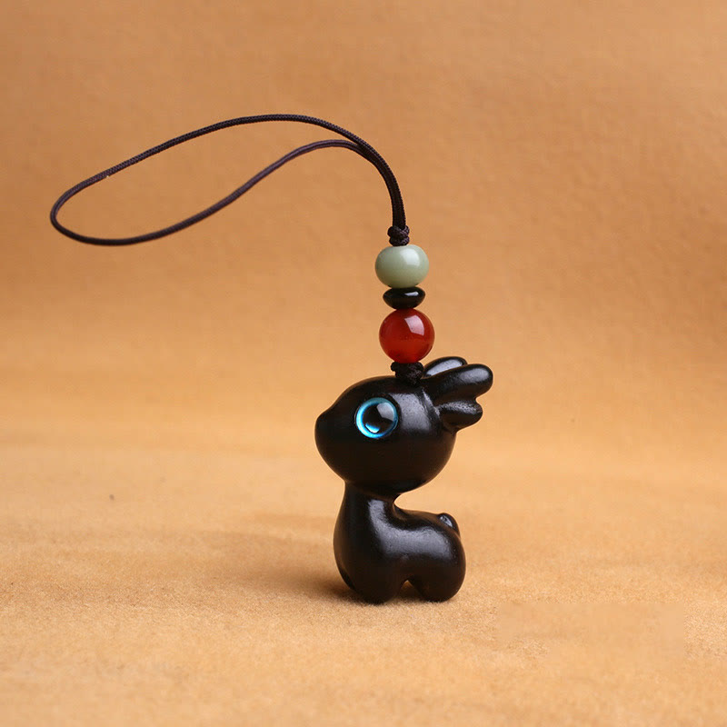 Porte-clés mini-protection contre les cerfs en bois de santal 35 mm